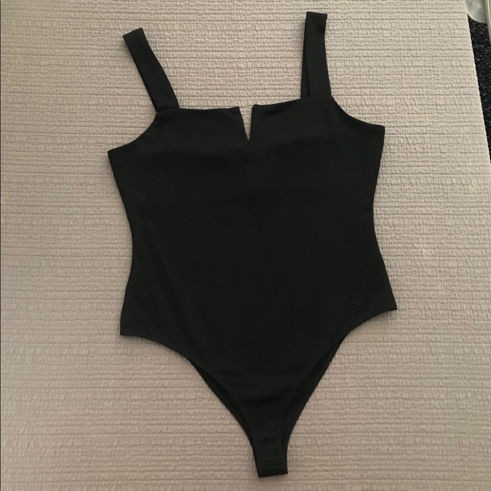 Isabelle’s Cabinet black body suit size medium